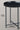 Detail shot of thick black iron legs with cross-brace design