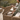 Natural beige outdoor rattan coffee table with storage compartment