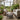 Round rattan coffee table in conservatory and patio setting