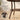 Round rattan garden coffee table with powder-coated metal frame and anti-slip feet