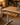KOWO K3101 wooden standing desk with built-in drawer storage in a warm home office