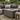 Outdoor rattan storage coffee table with easy-clean tempered glass top for garden and patio use