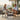 Round rattan coffee table used with outdoor seating on a patio balcony or garden area